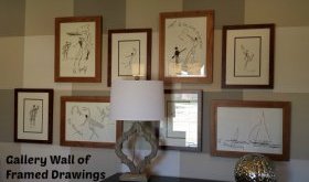 Gallery Wall of Framed Drawings in Study